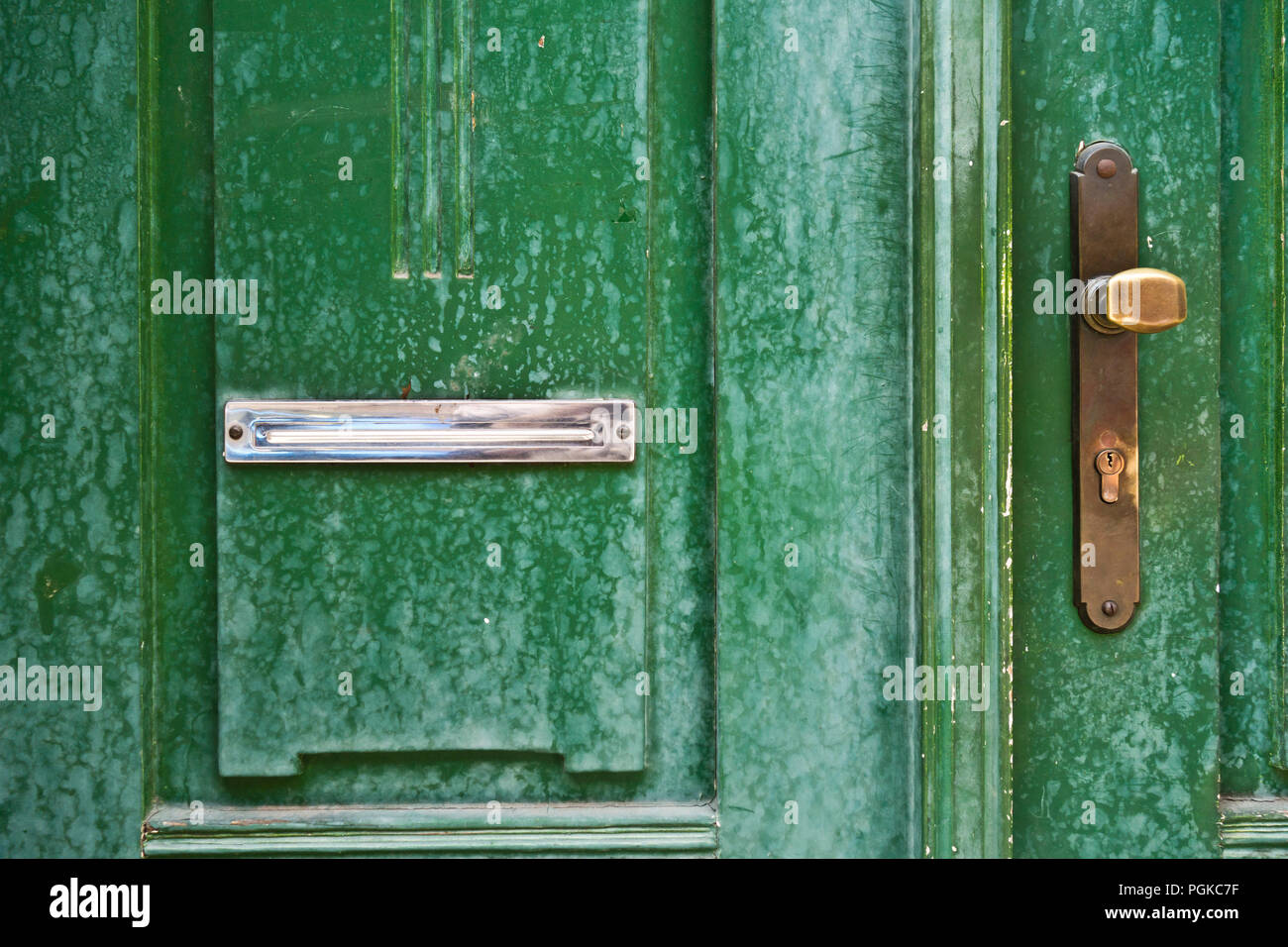 a mail slot in an old wooden door Stock Photo Alamy