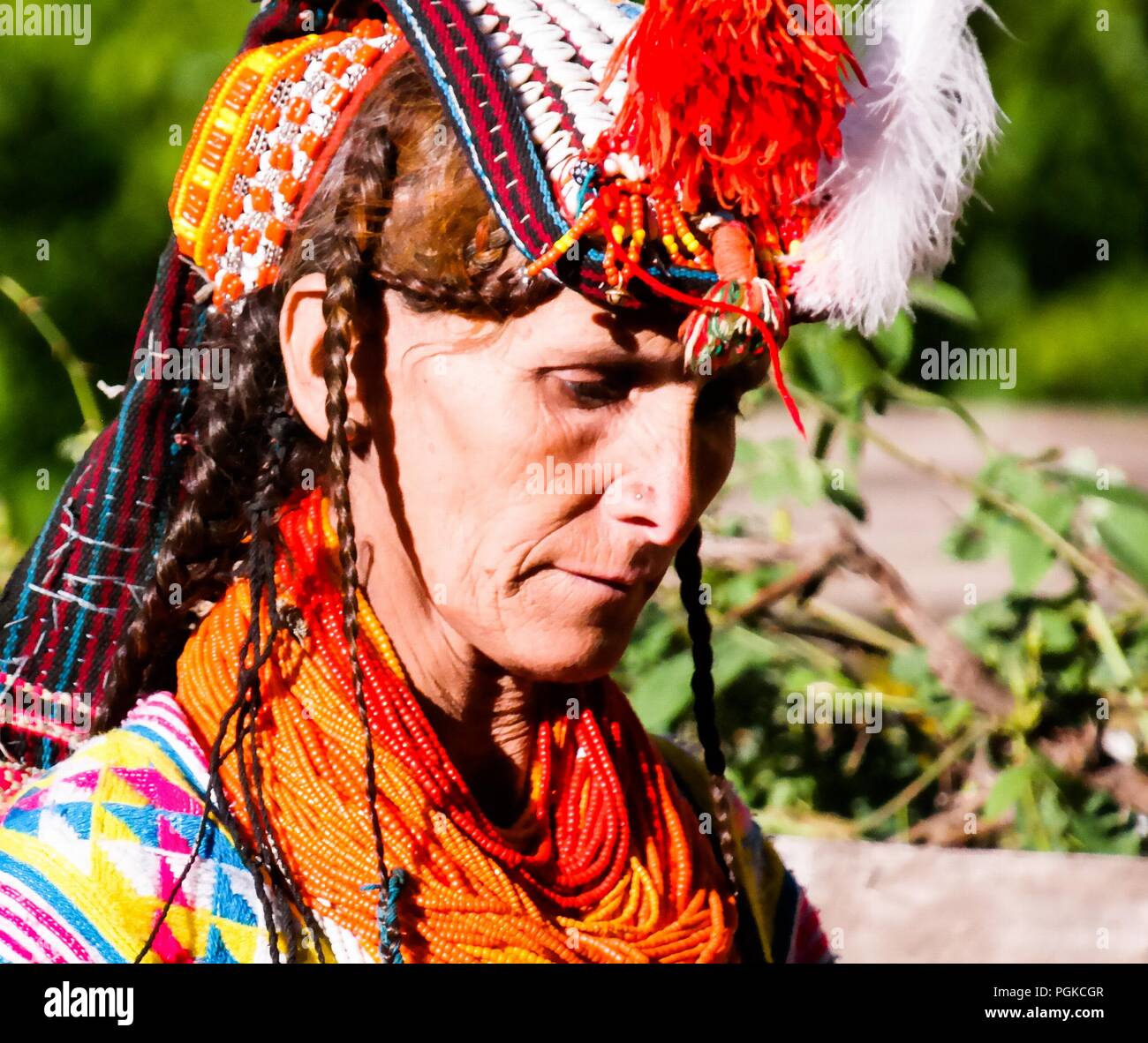 Portrait of Kalash tribe woman in national costume at Joshi fest - 14-05-2015 Bumburet, Kunar, Pakistan Stock Photo