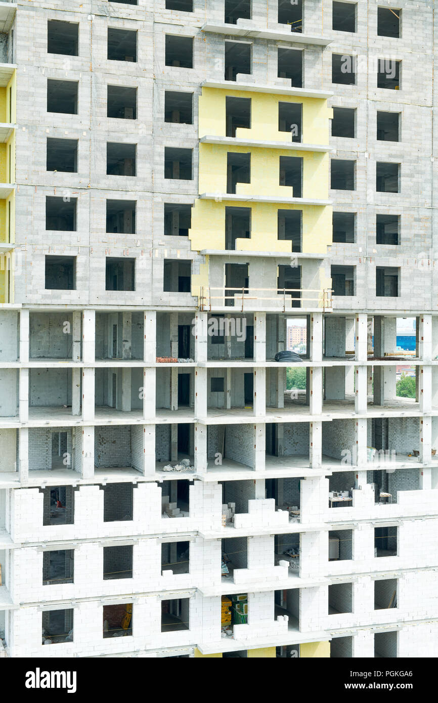 Background image of unfinished residential building on construction ...