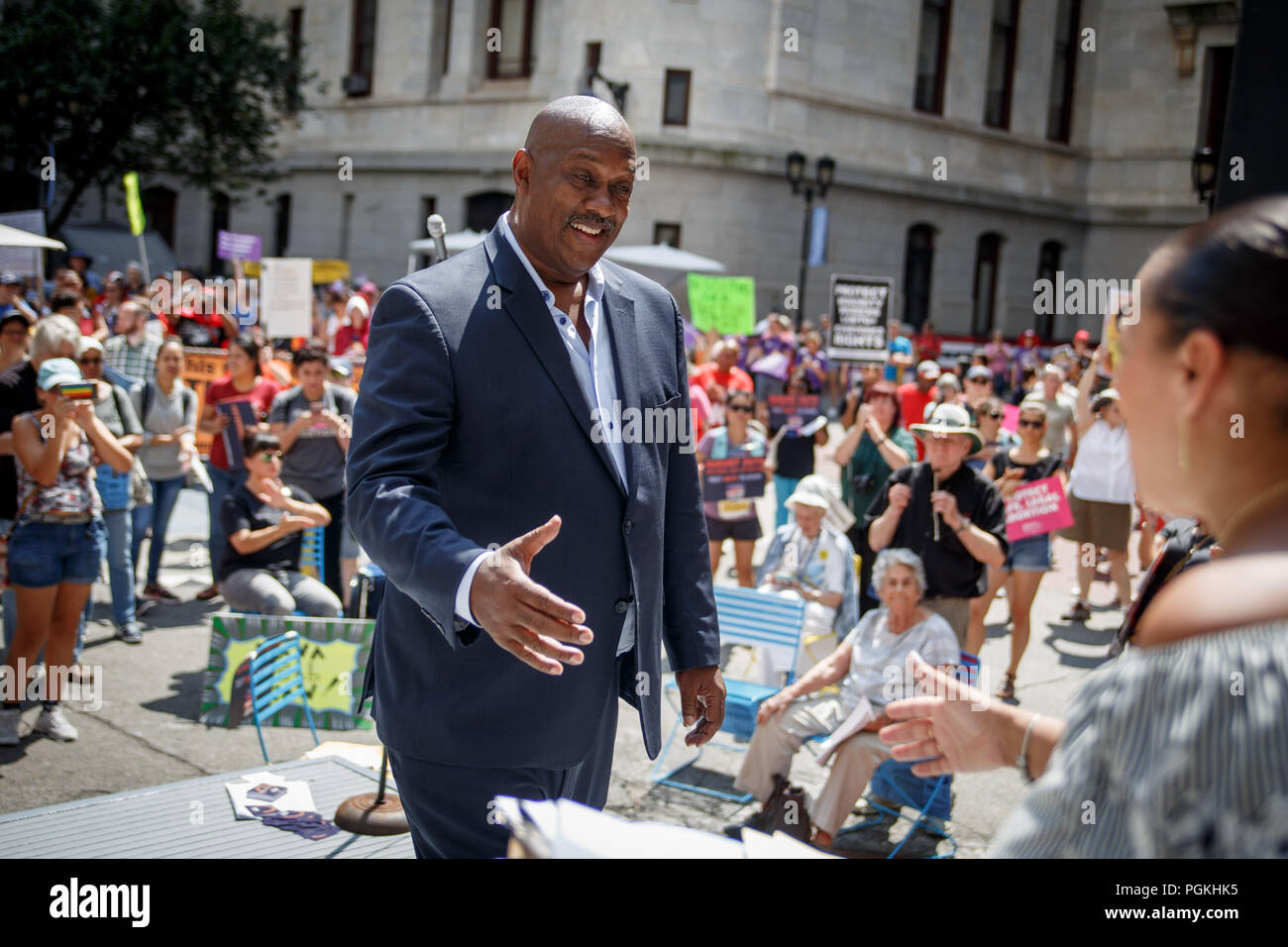 Philadelphia, United States. 26th Aug, 2018. Congressman Dwight Evans (PA-2) shakes hands after addressing demonstrators gathered for the Unite for Justice rally held in the courtyard of City Hall, organized by progressive activists to oppose the confirmation of President Trump's nominee for the Supreme Court, Brett Kavanaugh. Credit: Michael Candelori/Pacific Press/Alamy Live News Stock Photo