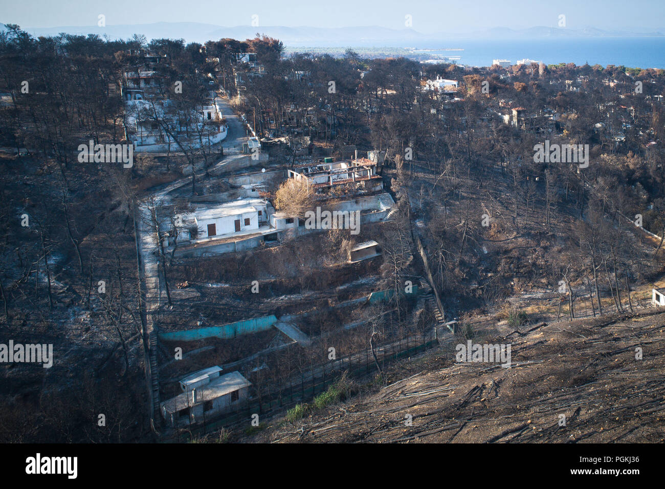 Mati, Athens - July 26, 2018: Aerial view shows a burnt area following a wildfire in the village of Mati, near Athens. Wildfires occurred on the 23 of Stock Photo