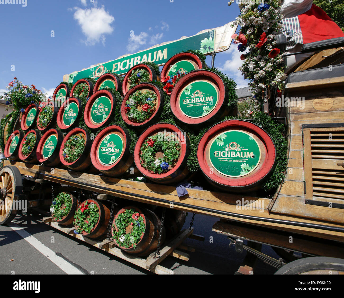 Worms, Germany. 26th Aug, 2018. The Eichbaum brewery uses a vintage horse-drawn cart with beer barrel. The first highlight of the 2018 Backfischfest was the big parade through the city of Worms with over 70 groups and floats. Community groups, music groups and businesses from Worms and further afield took part. Credit: Michael Debets/Pacific Press/Alamy Live News Stock Photo