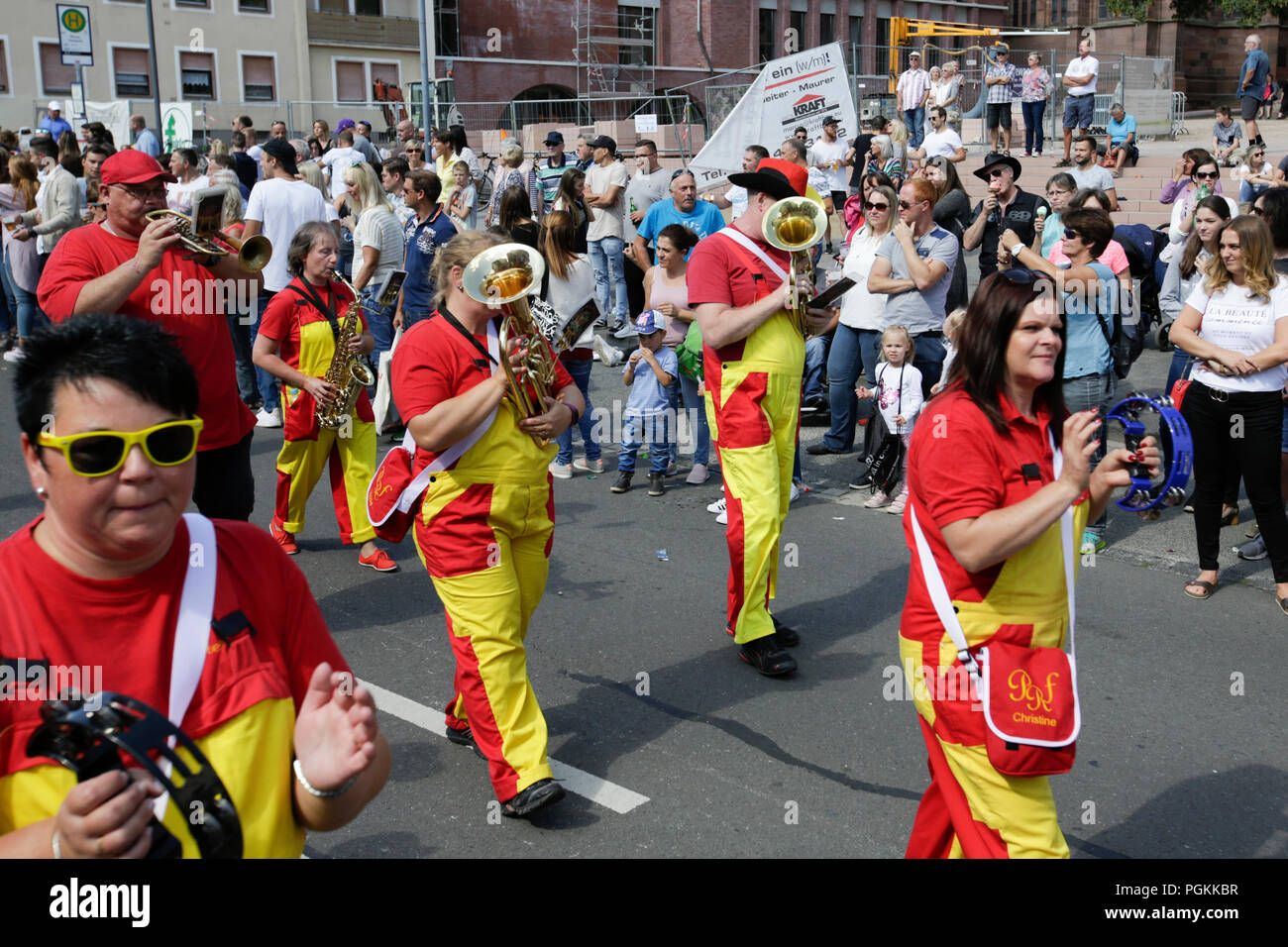 Worms, Germany. 26th Aug, 2018. Members of the Pfalzer-Rhythmusfetzer Landstuhl Guggenmusik band perform in the parade. The first highlight of the 2018 Backfischfest was the big parade through the city of Worms with over 70 groups and floats. Community groups, music groups and businesses from Worms and further afield took part. Credit: Michael Debets/Pacific Press/Alamy Live News Stock Photo