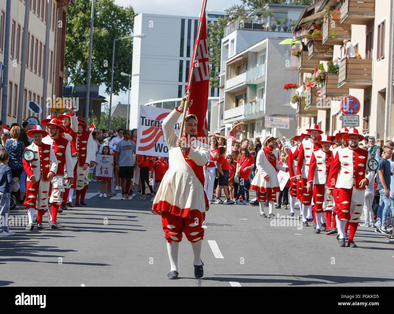 Worms, Germany. 26th Aug, 2018. Journeymen march in the parade in traditional costume. The first highlight of the 2018 Backfischfest was the big parade through the city of Worms with over 70 groups and floats. Community groups, music groups and businesses from Worms and further afield took part. Credit: Michael Debets/Pacific Press/Alamy Live News Stock Photo