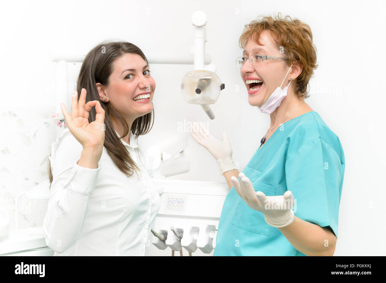 A happy young woman after dentist visit Stock Photo