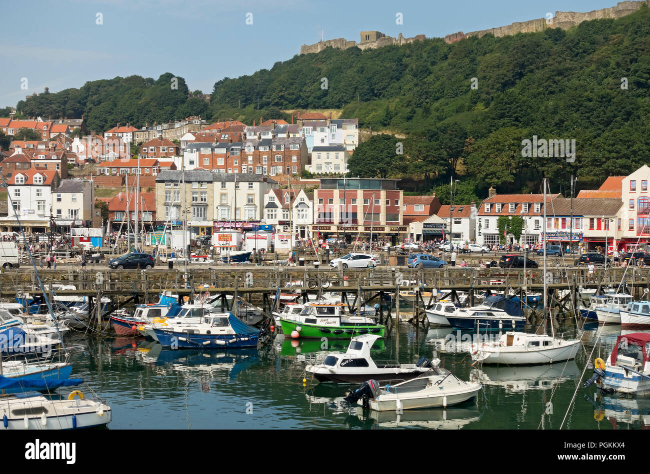 Boats moored in the harbour harbor in summer Scarborough seaside town resort North Yorkshire England UK United Kingdom GB Great Britain Stock Photo
