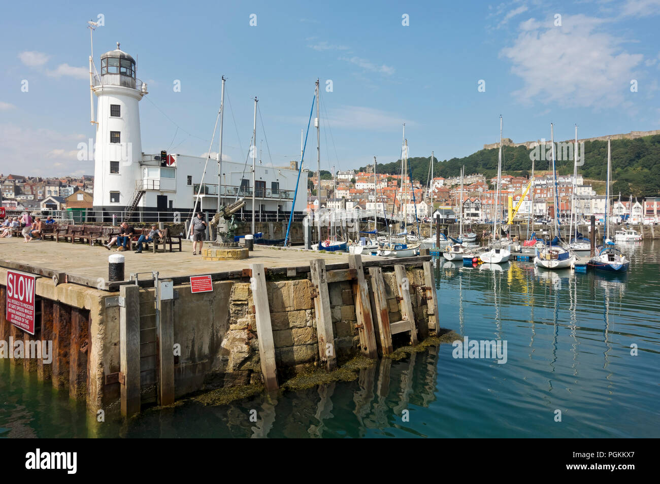Lighthouse and Inner Harbour in summer Scarborough North Yorkshire England UK United Kingdom GB Great Britain Stock Photo