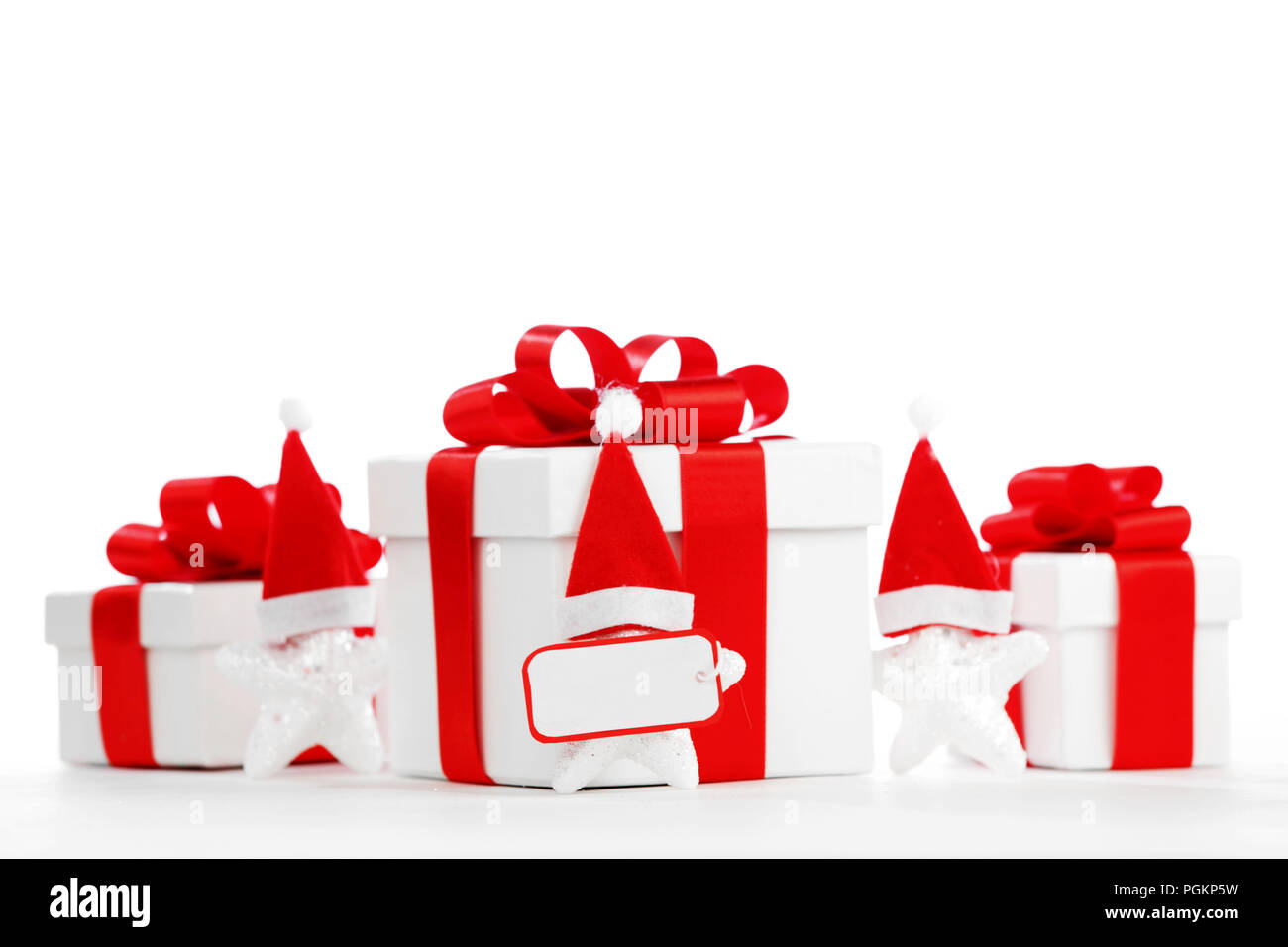 Gift boxes with santa claus stars isolated on white background Stock ...