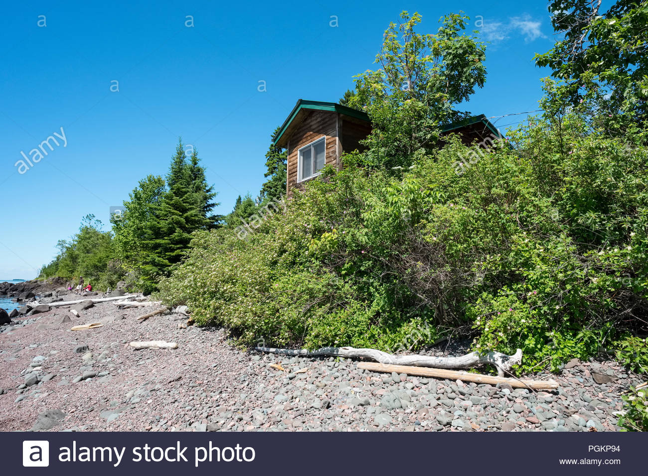 Cabin Is Perched On A Low Cliff With Sweeping Views Of Lake