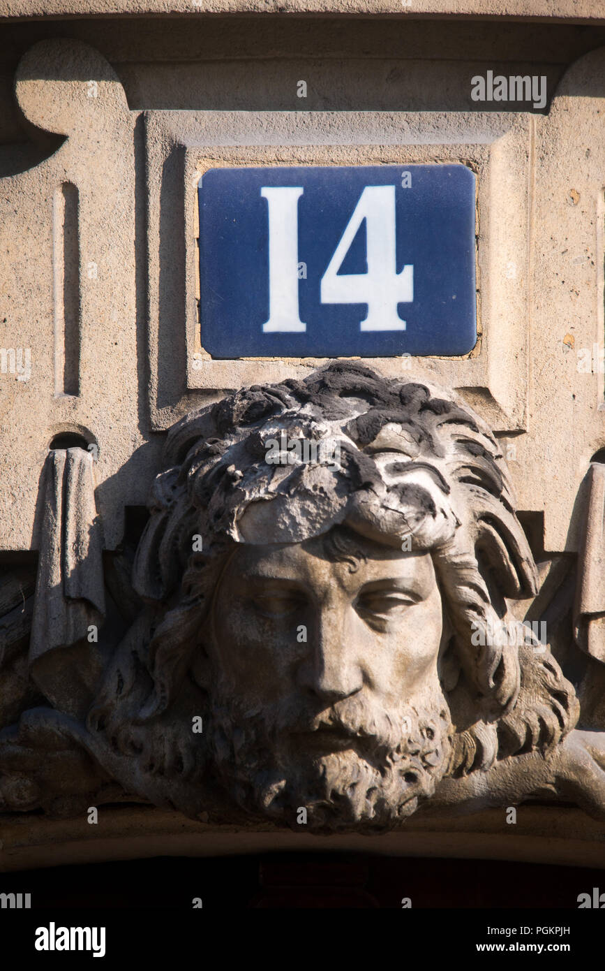 A classic French house number plate, 14, in Paris Stock Photo