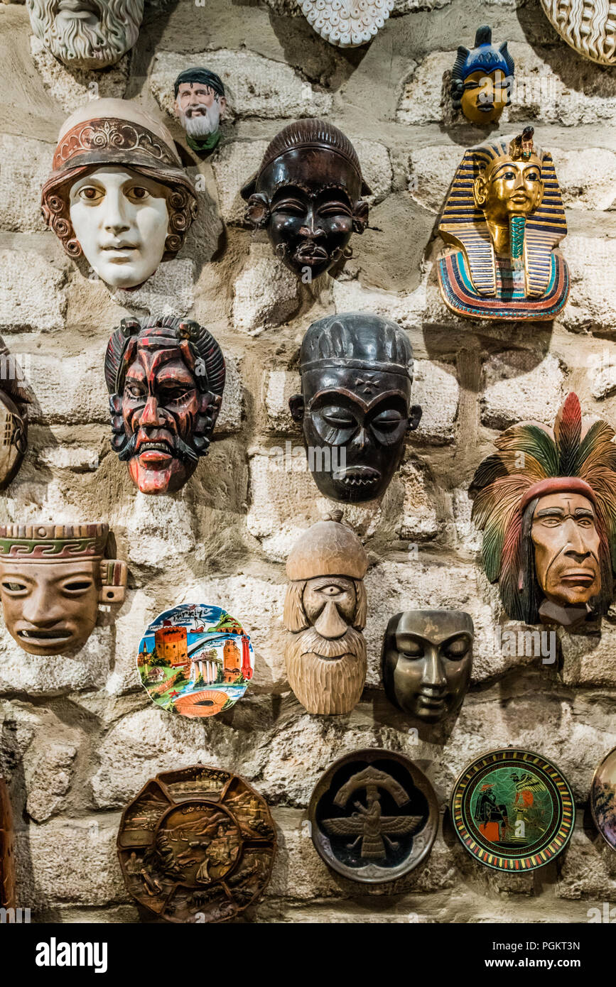 masks hanging on wall. Collection of masks Stock Photo Alamy