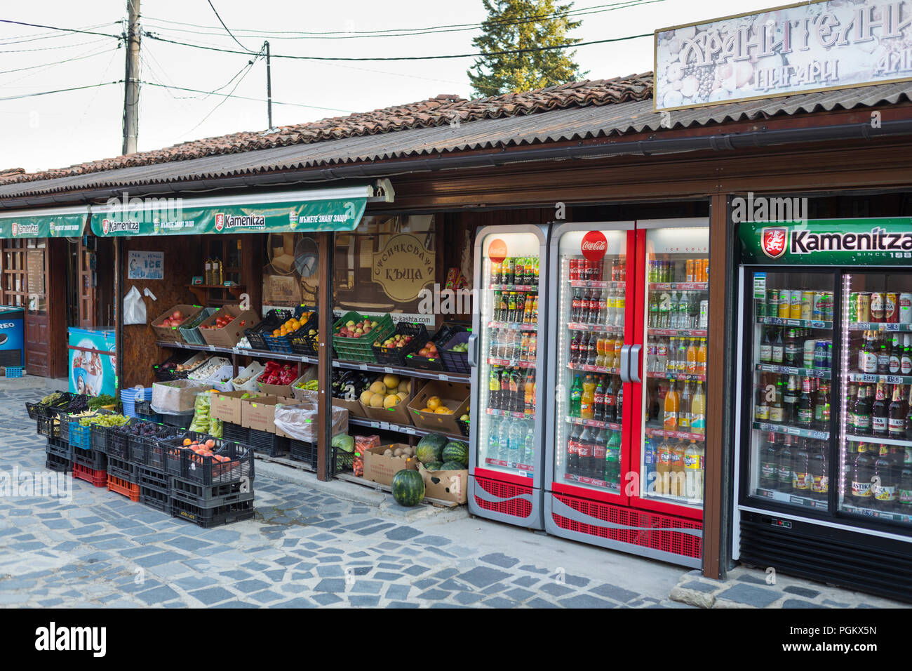 Grocery and food shop, also selling cool beverages in the inner city of Koprivshitsa, Bulgaria Stock Photo
