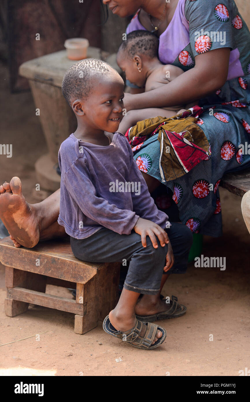 PIRA, BENIN - JAN 12, 2017: Unidentified Beninese little boy sits on ...