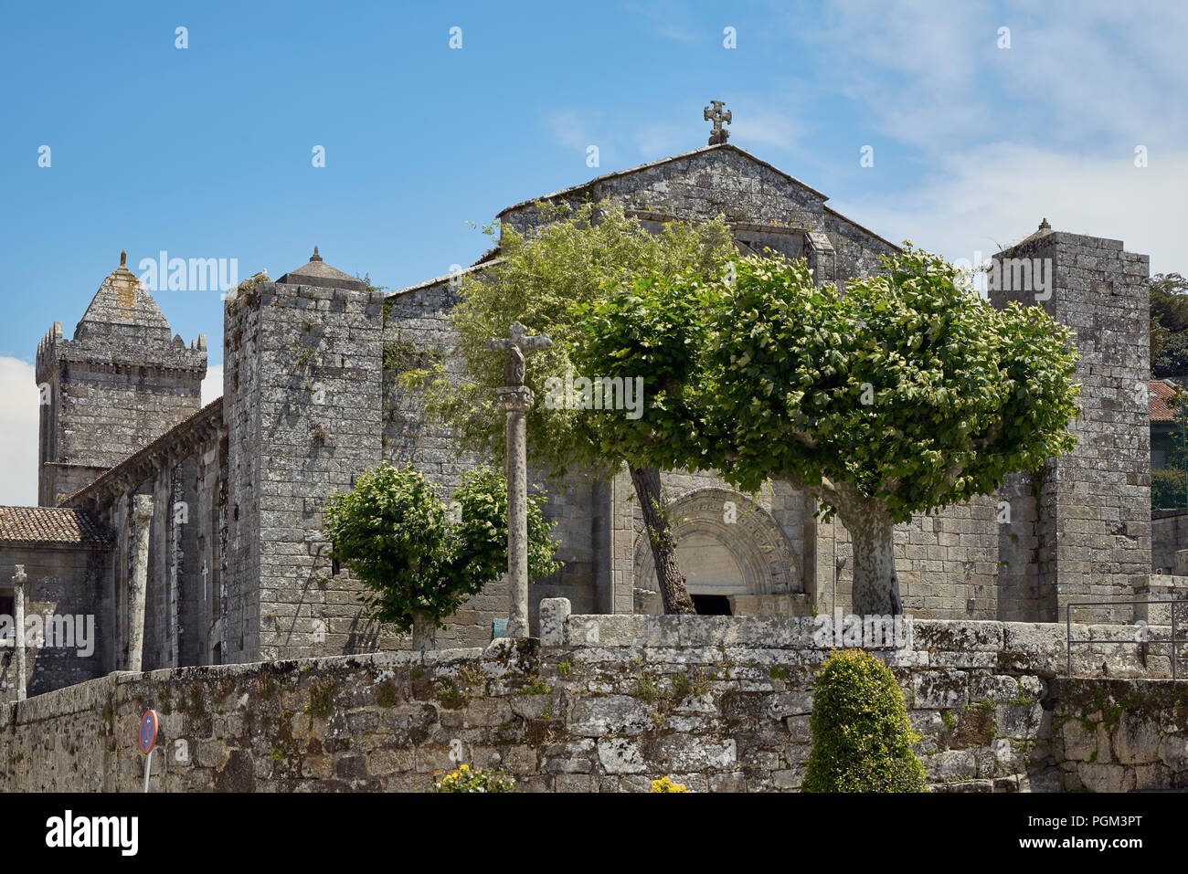 Ex-Collegiate Church of Santa María with a fortified aspect and Romanesque ogee style in Baiona, Galicia, Spain, Europe Stock Photo