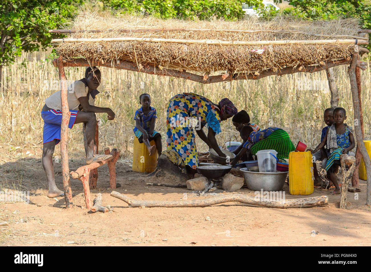 KOUTAMMAKOU, TOGO JAN 13, 2017 Unidentified Togolese people sit in