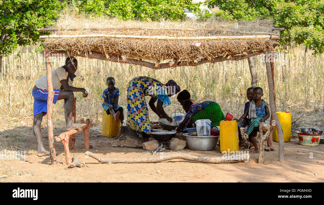 KOUTAMMAKOU, TOGO JAN 13, 2017 Unidentified Togolese people sit in
