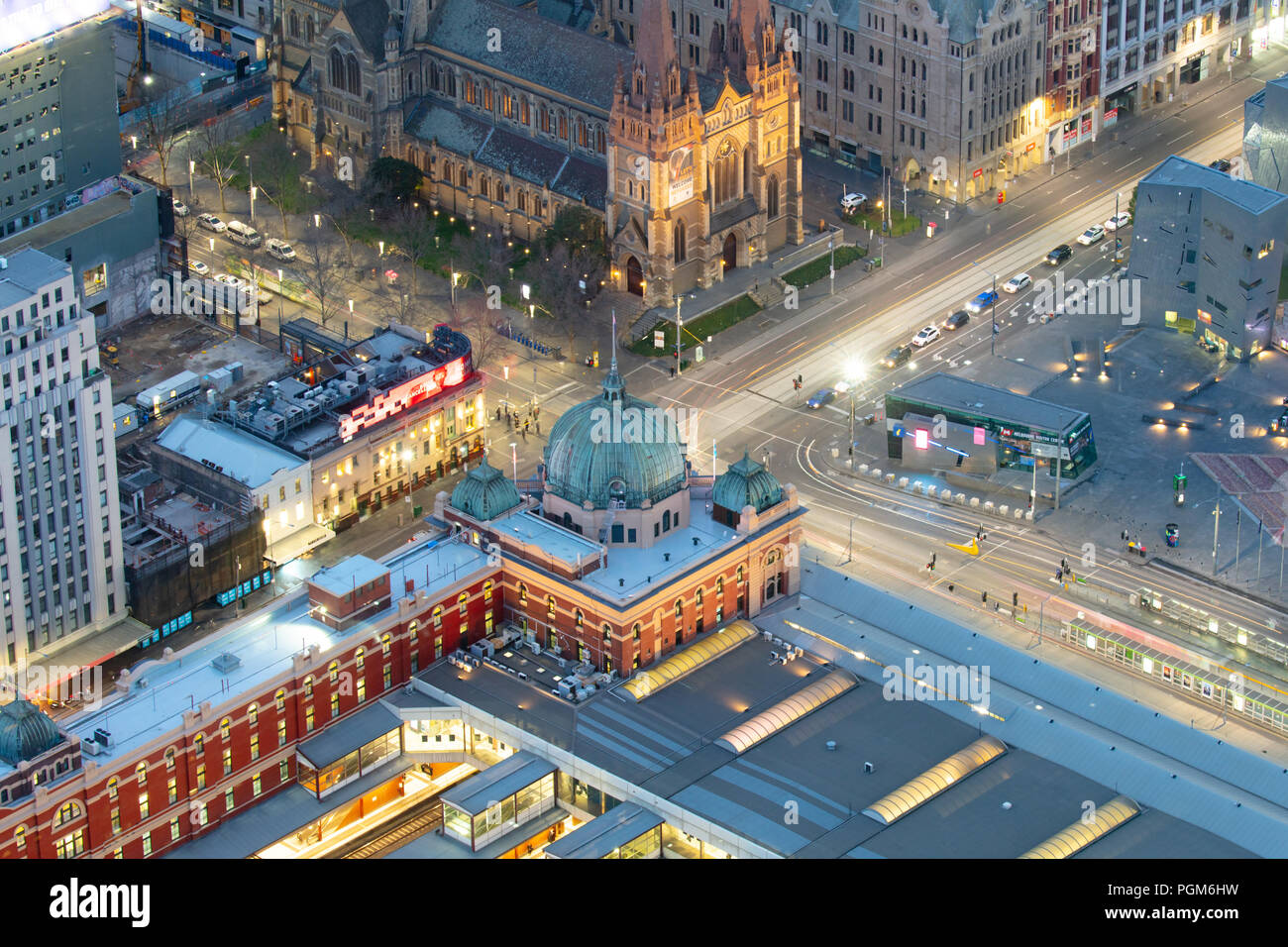 Swanston St and Flinders St intersection just before sunrise  in Melbourne CBD in Victoria, Australia Stock Photo