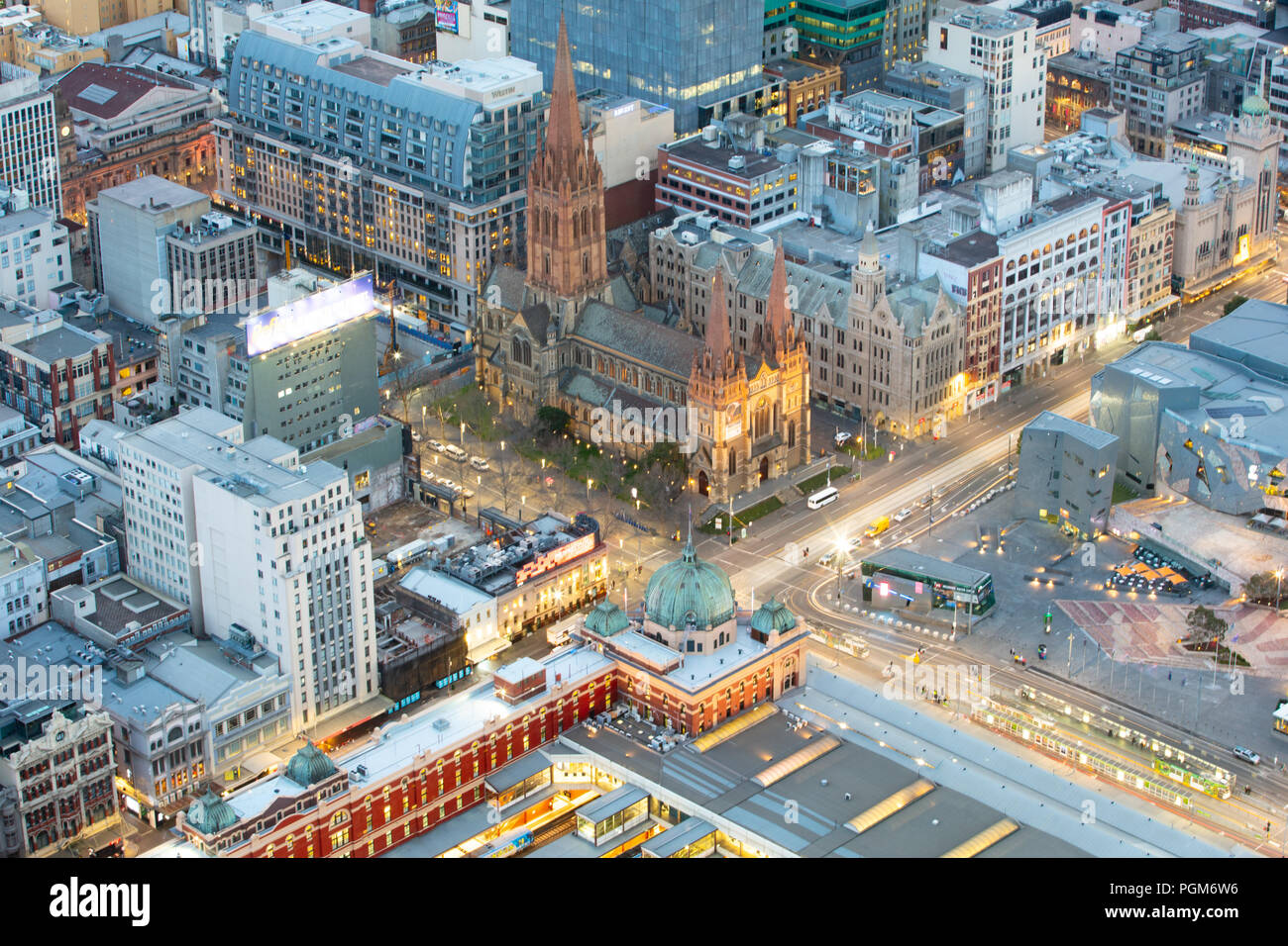 Swanston St and Flinders St intersection just before sunrise  in Melbourne CBD in Victoria, Australia Stock Photo