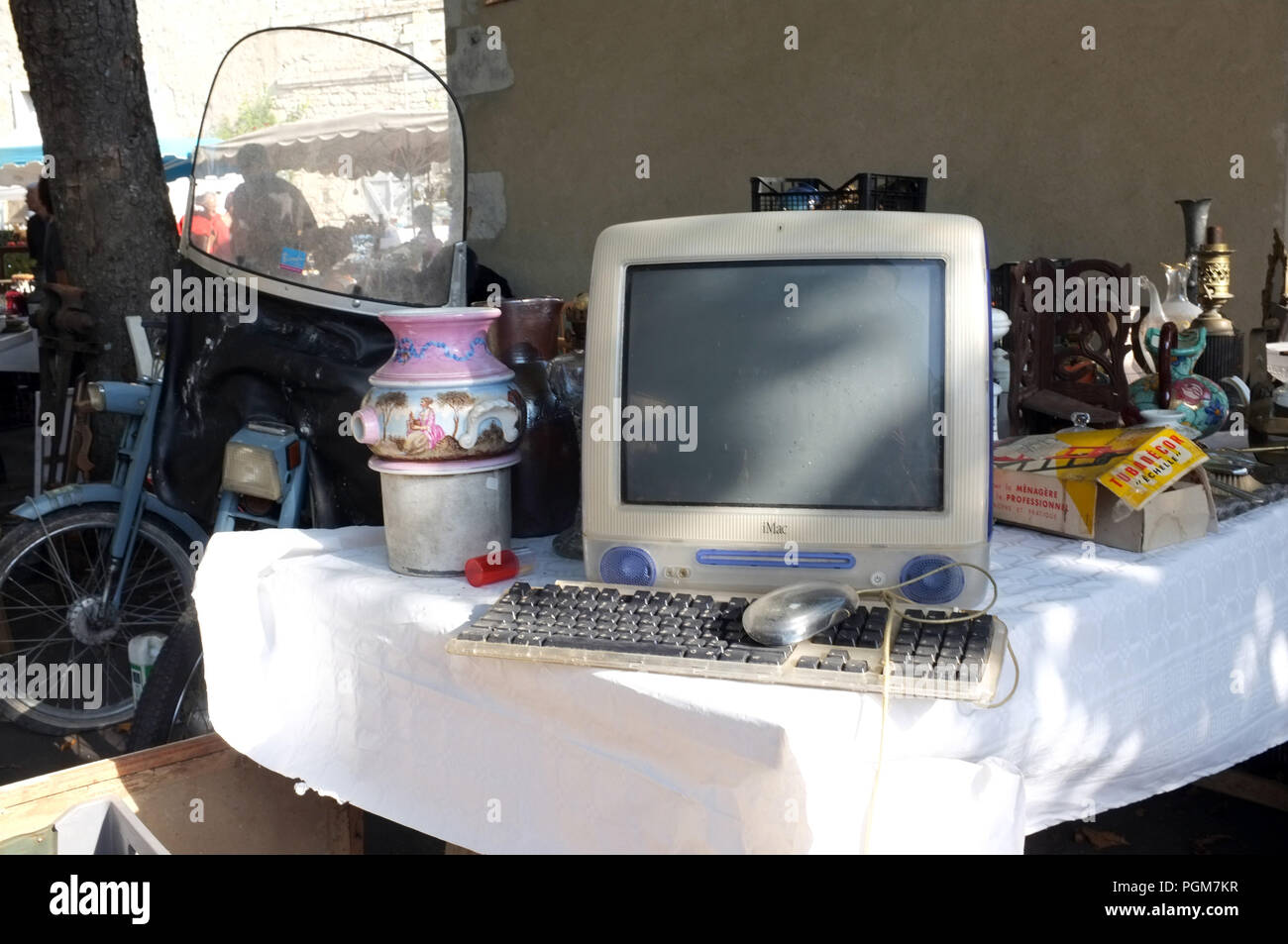 A used early model Apple Mac computer on sale at a French market stall in 2018. Stock Photo