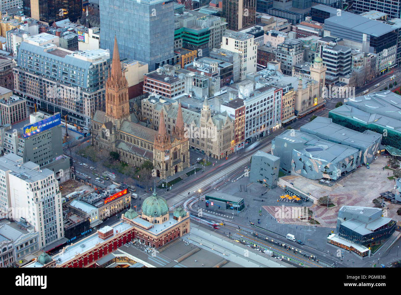 Swanston St and Flinders St intersection just before sunrise  in Melbourne CBD in Victoria, Australia Stock Photo