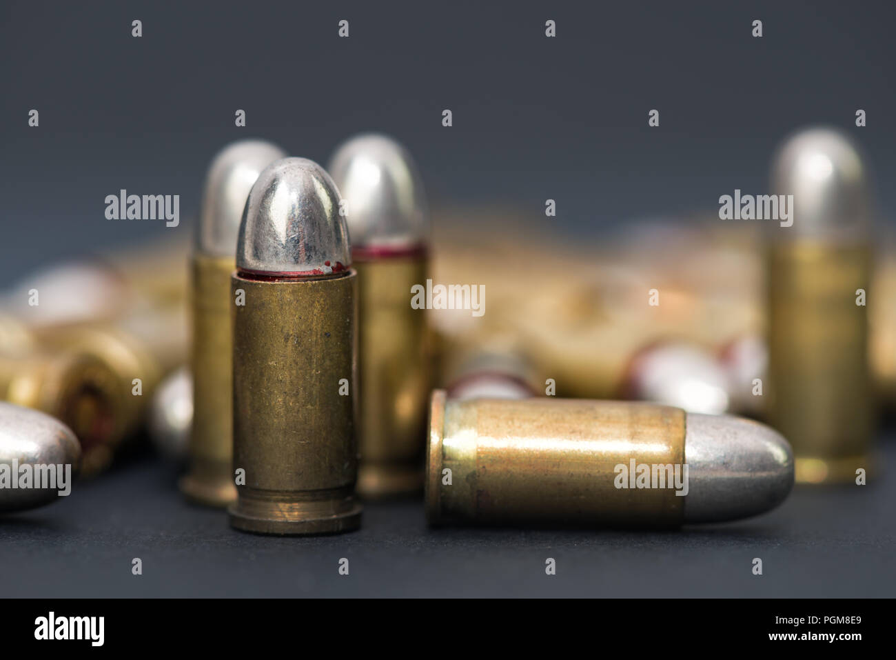 ammunition bullets , dark grey backround Stock Photo