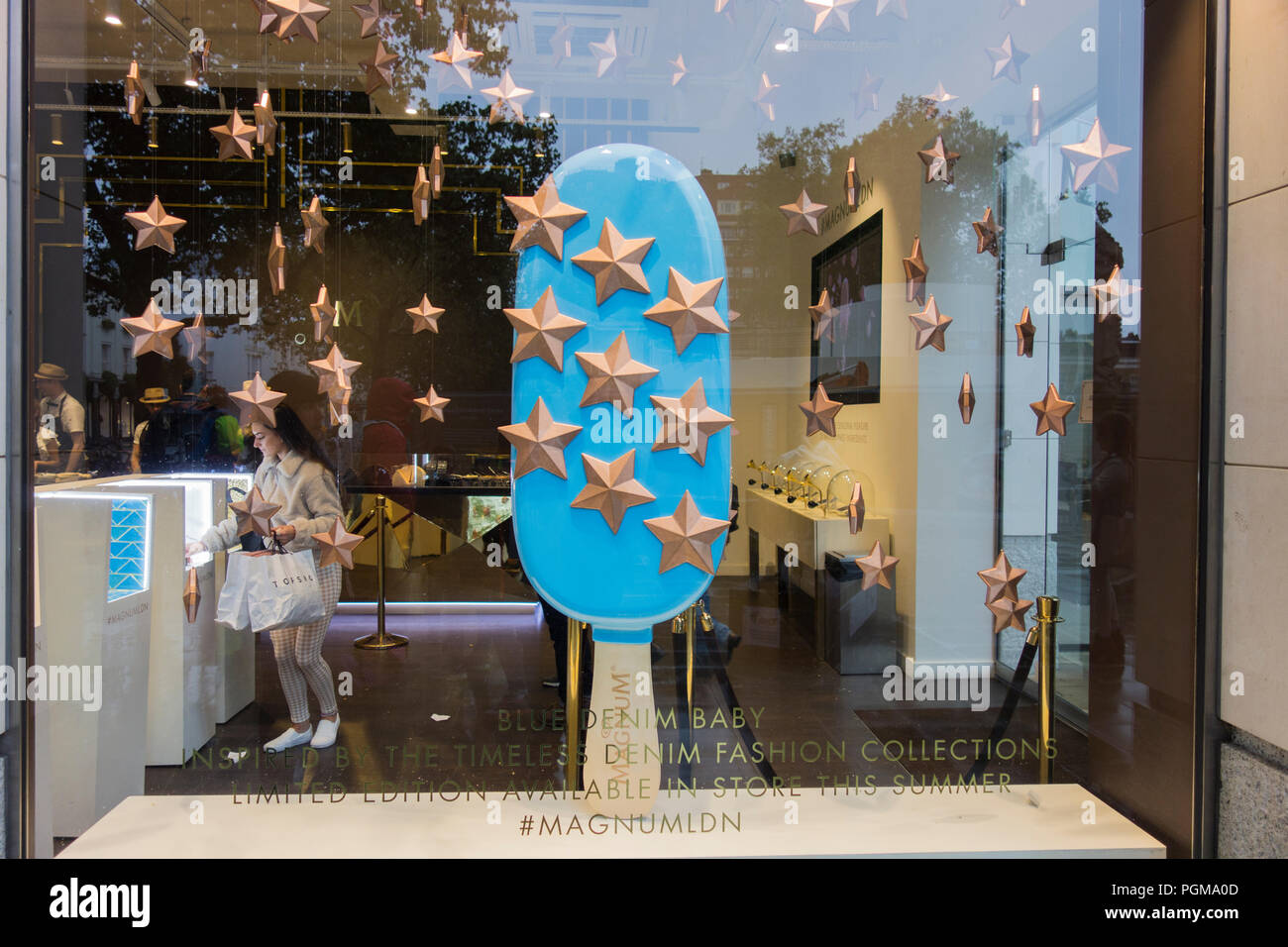 A light blue lolly in the window of the Magnum Pleasure Store at Duke of York Square, off King's Road, Chelsea, London, SW3, England, U.K. Stock Photo