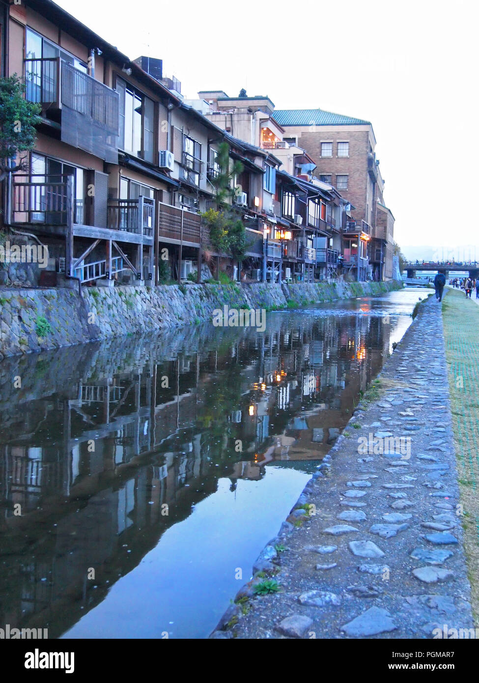 The Kamogawa river in Kyoto at sunset Stock Photo