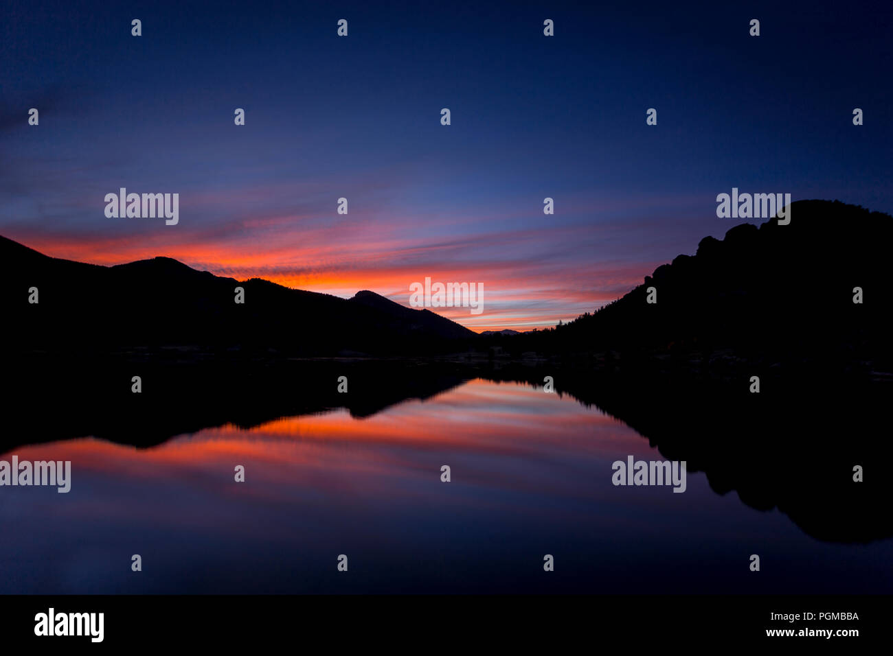 Twilight colours reflecting in Lily Lake in the Rocky Mountains, Colorado, USA Stock Photo