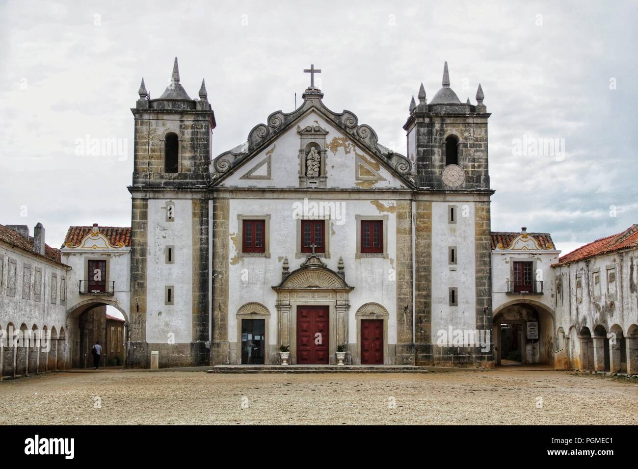 Sanctuary of Our Lady of Cape Espichel in Portugal under cloudy sky Stock Photo