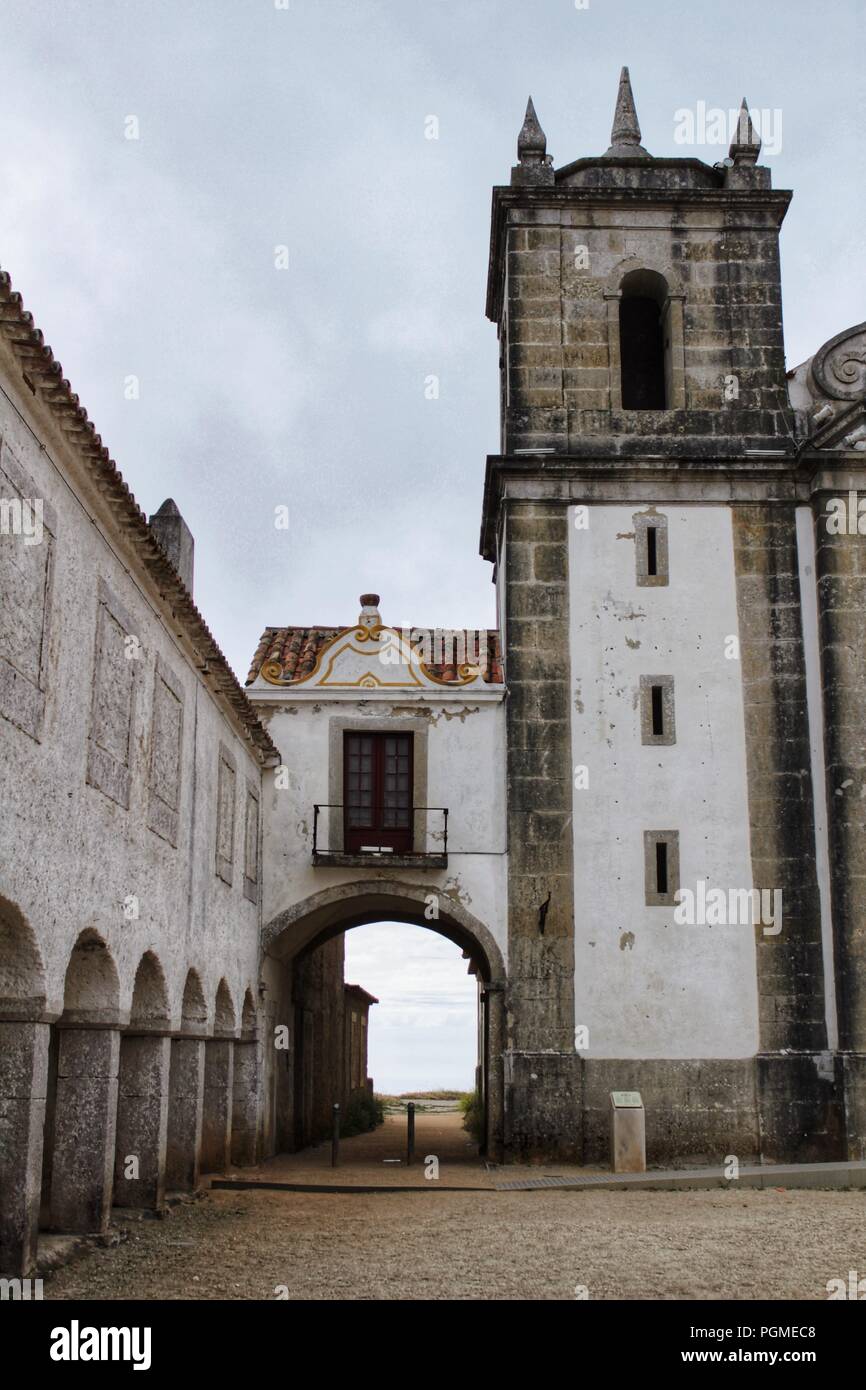 Sanctuary of Our Lady of Cape Espichel in Portugal under cloudy sky Stock Photo