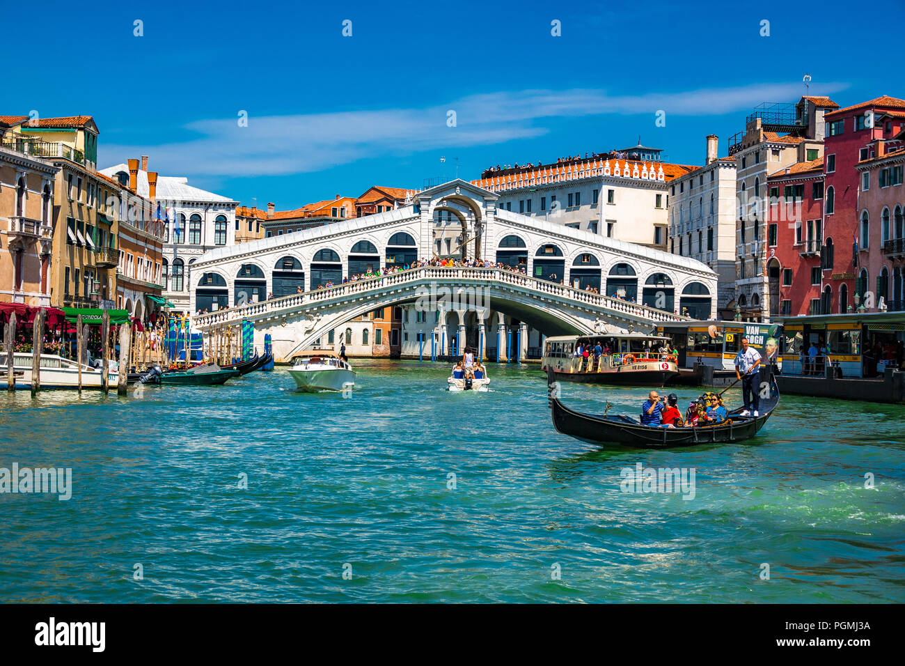 The Rialto Bridge, also known as Ponte di Rialto and a gondola on the