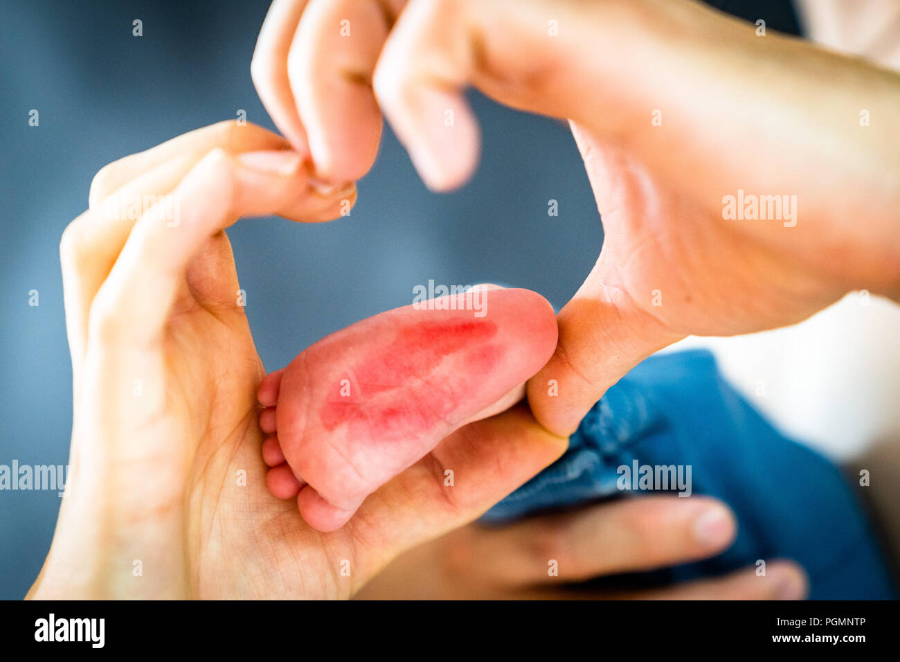 the baby's foot with kiss Stock Photo