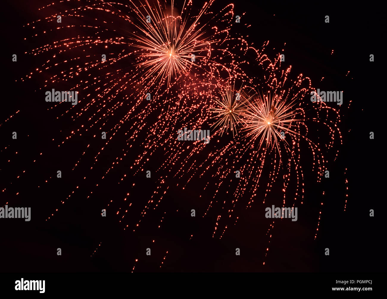 Red Fireworks Fireworks Effect On Dark Sky Background Stock Photo