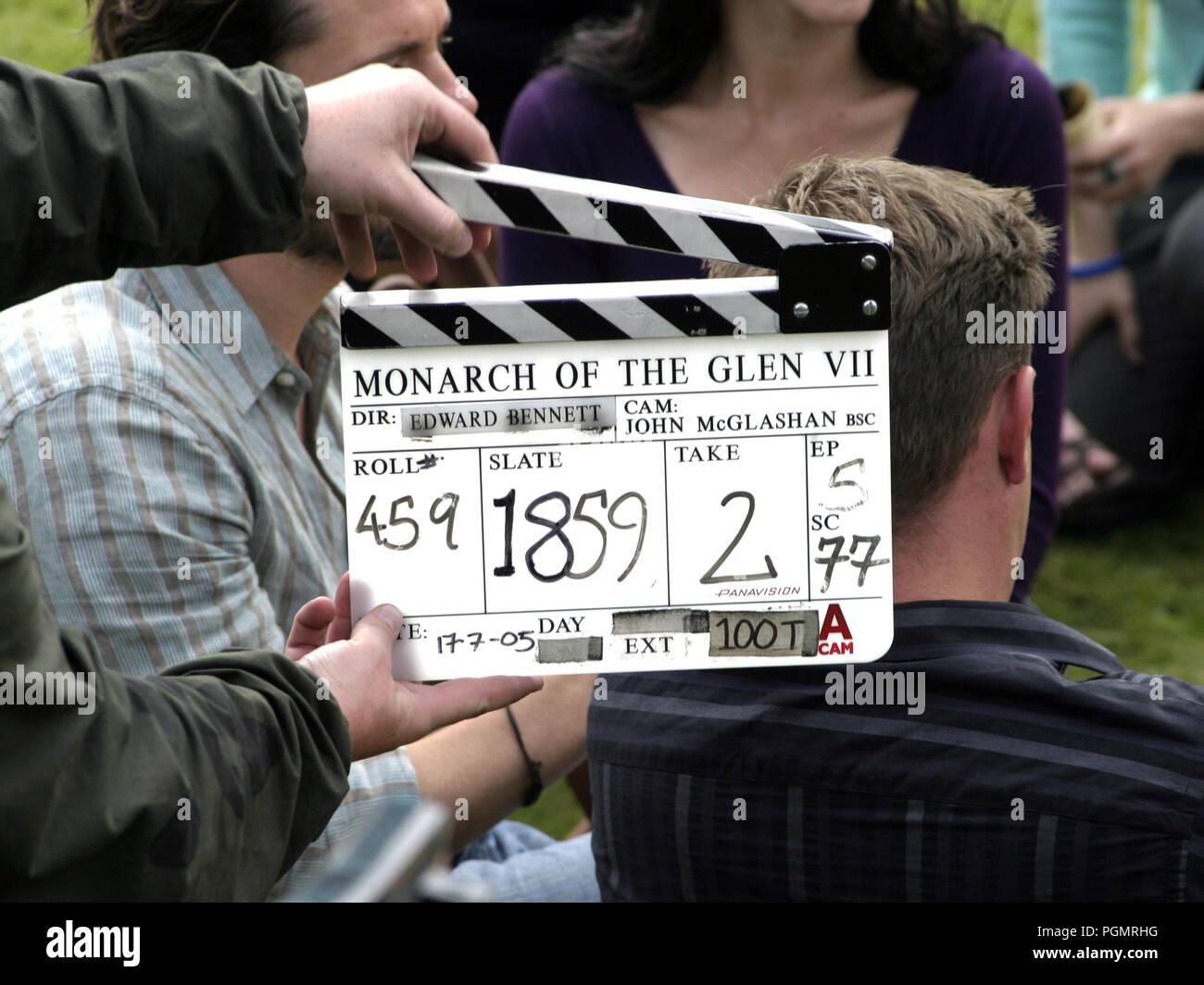 A clapperboard being used on the television programme, Monarch of the Glen which was filmed in Scotland. Stock Photo