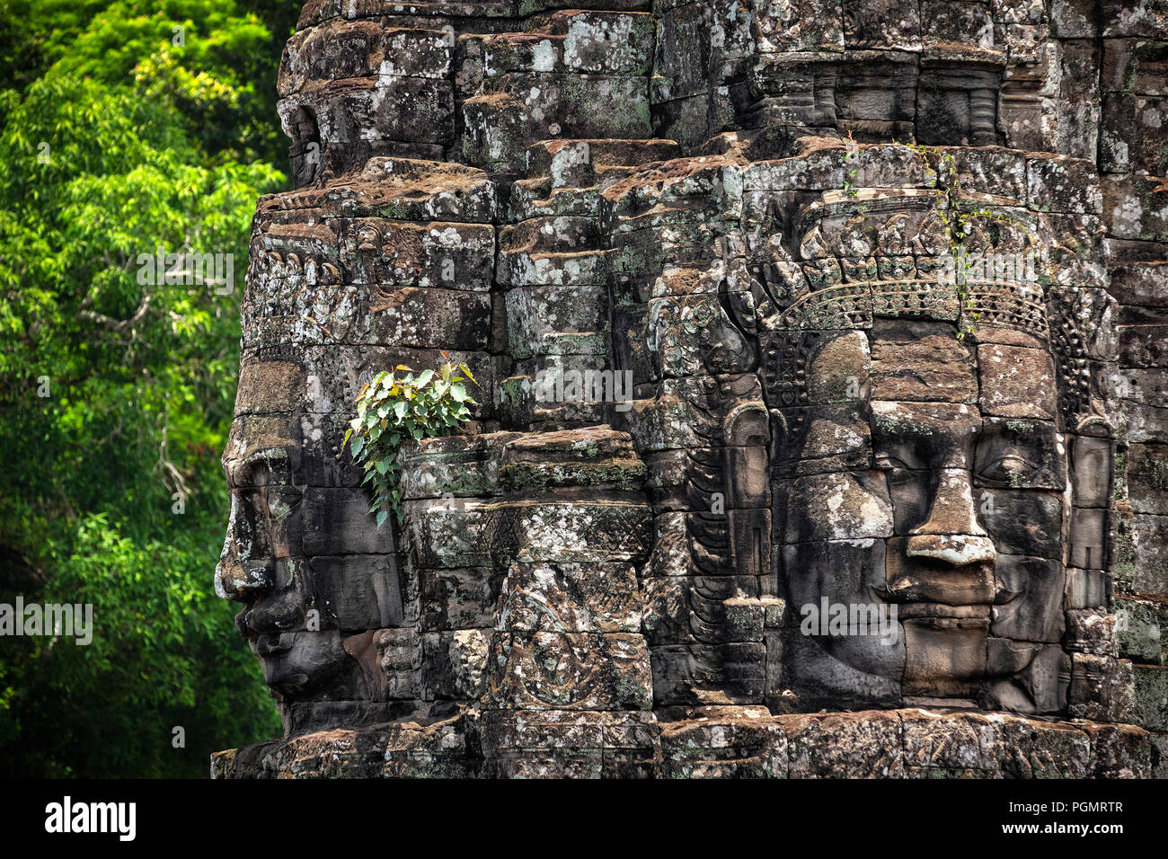The Bayon, main temple of the ancient town of Angkor Thom at Siem Reap province (Cambodia - Asia). The most famous Cambodian monument. Stock Photo