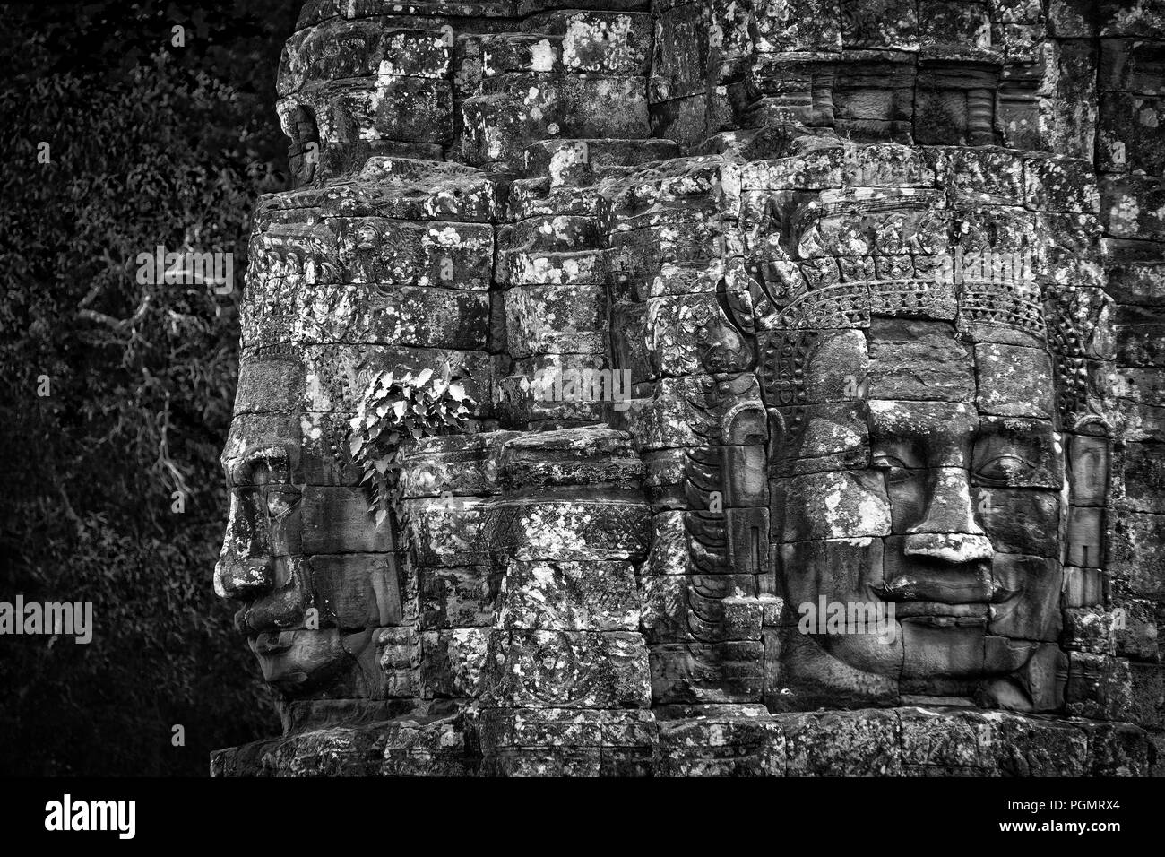 The Bayon, main temple of the ancient town of Angkor Thom (Cambodia Asia). The most famous Cambodian monument. Black and white. Stock Photo
