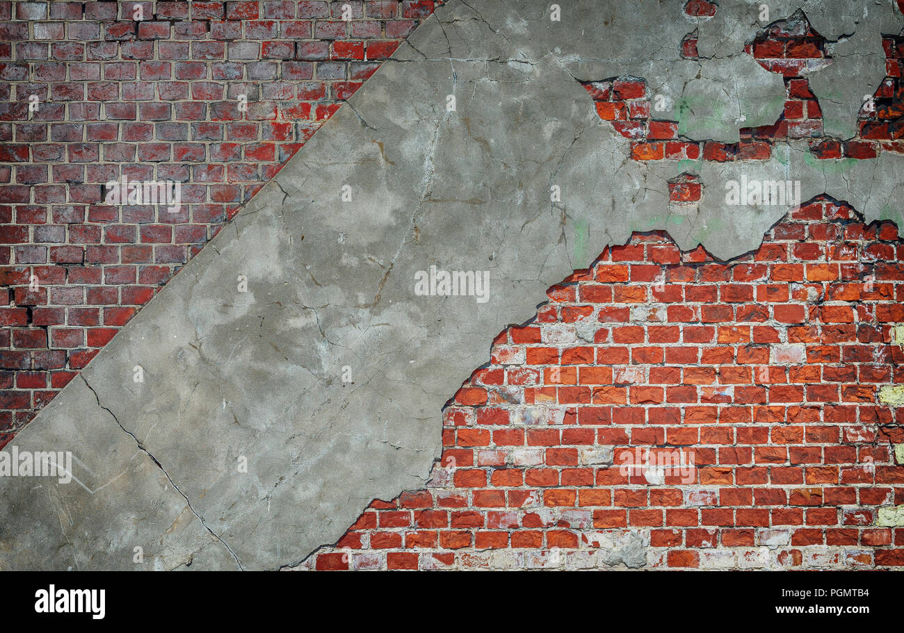 Old brick wall with concrete pieces Stock Photo