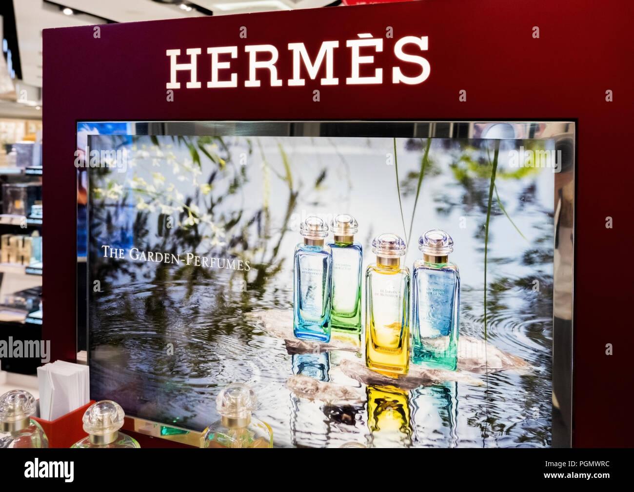 LONDON, UK - AUGUST 31, 2018: Hermes perfume and cosmetic makeup luxury collection in boutique store. Elegant shop. Stock Photo