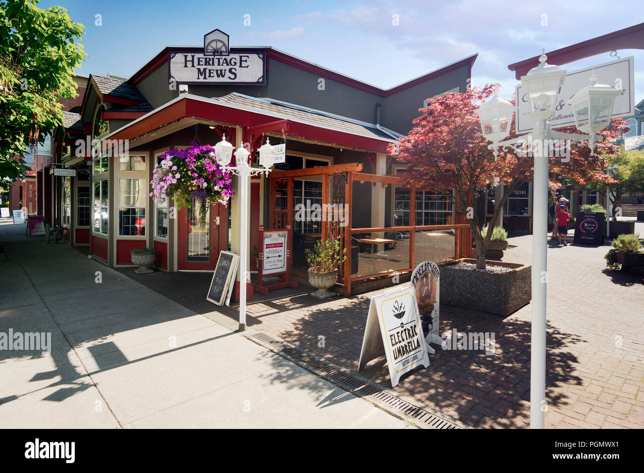 La Stella Trattoria restaurant and other shops at the Heritage Mews, Wesley Street, Old City Quarter of Nanaimo, Vancouver Island, British Columbia, C Stock Photo