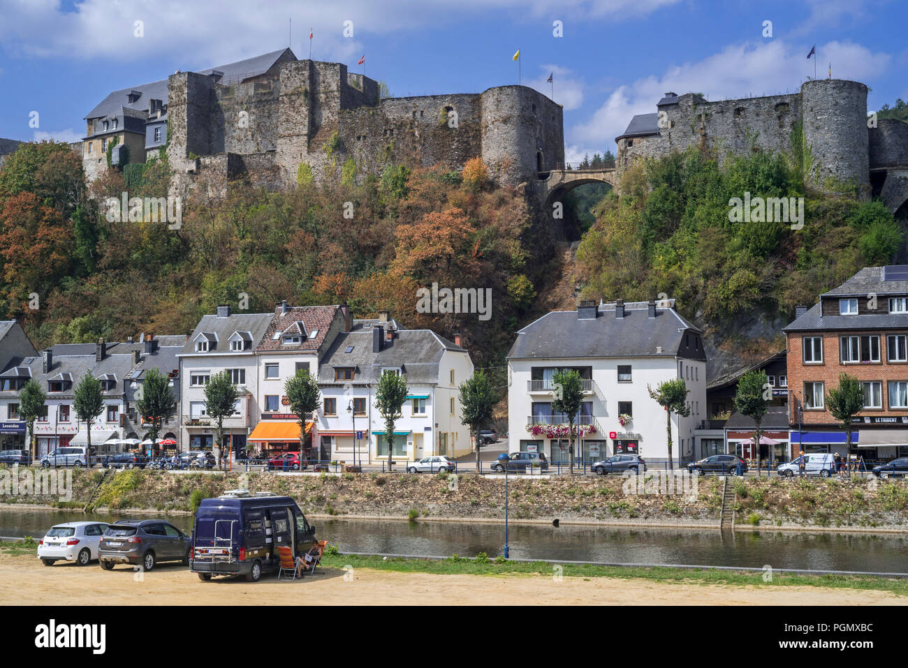 Campervan / motorhome on parking along the Semois river with view over