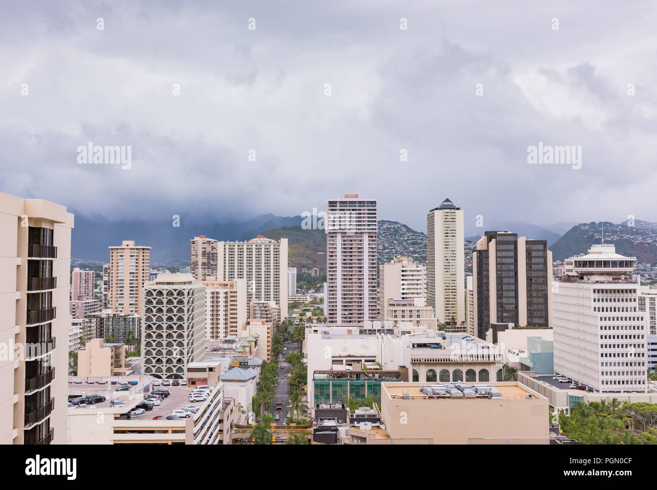 Honolulu, Hawaii / USA - August 26, 2018: Aerial view of clouds over Waikiki tall buildings as aftermath of Hurricane Lane lingers. Stock Photo