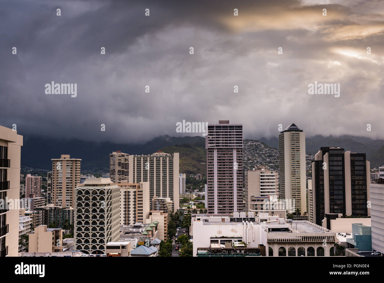 Honolulu, Hawaii / USA - August 26, 2018: Aerial view of amazing cloudscape over Waikiki tall buildings as aftermath of Hurricane Lane lingers. Stock Photo