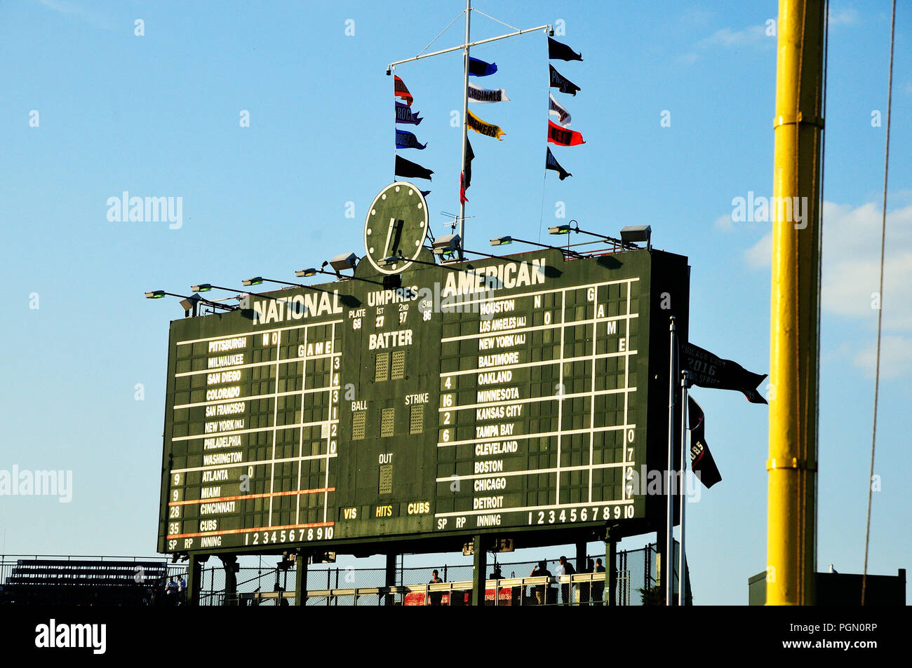 Chicago's MLB baseball stadium Wrigley Field is where the Chicago Cubs play baseball. Night game Cubs vs Cincinnati Reds. Stock Photo