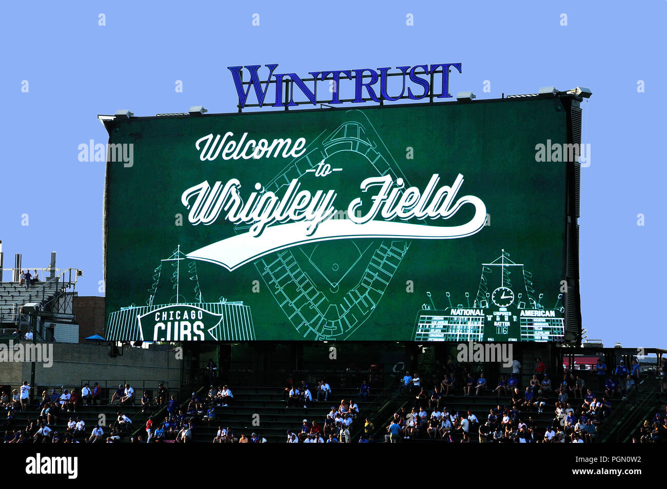 Chicago's MLB baseball stadium Wrigley Field is where the Chicago Cubs play baseball. Night game Cubs vs Cincinnati Reds. Stock Photo