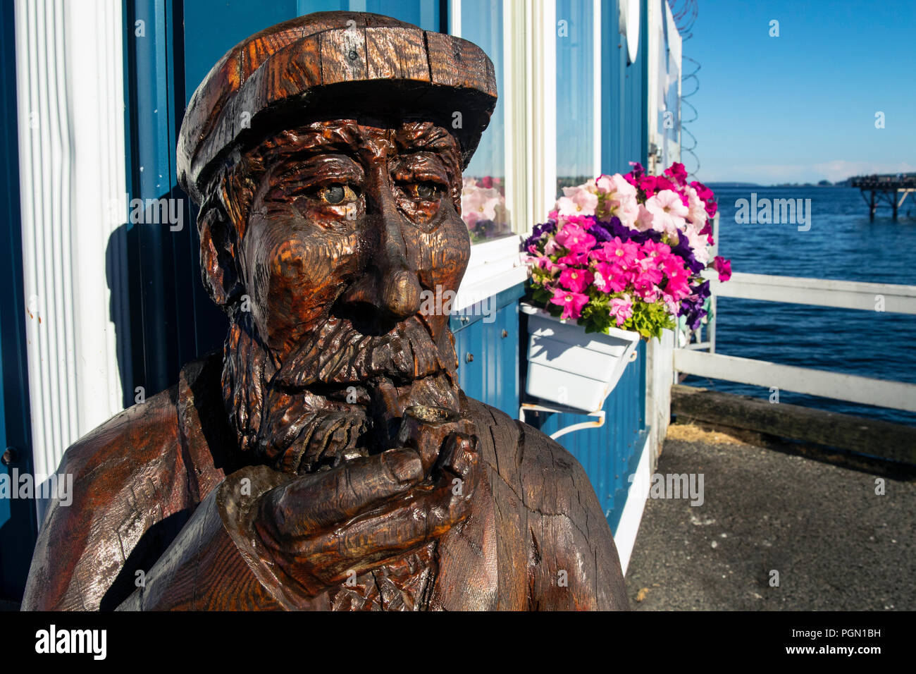 Fisherman wood carving hires stock photography and images Alamy