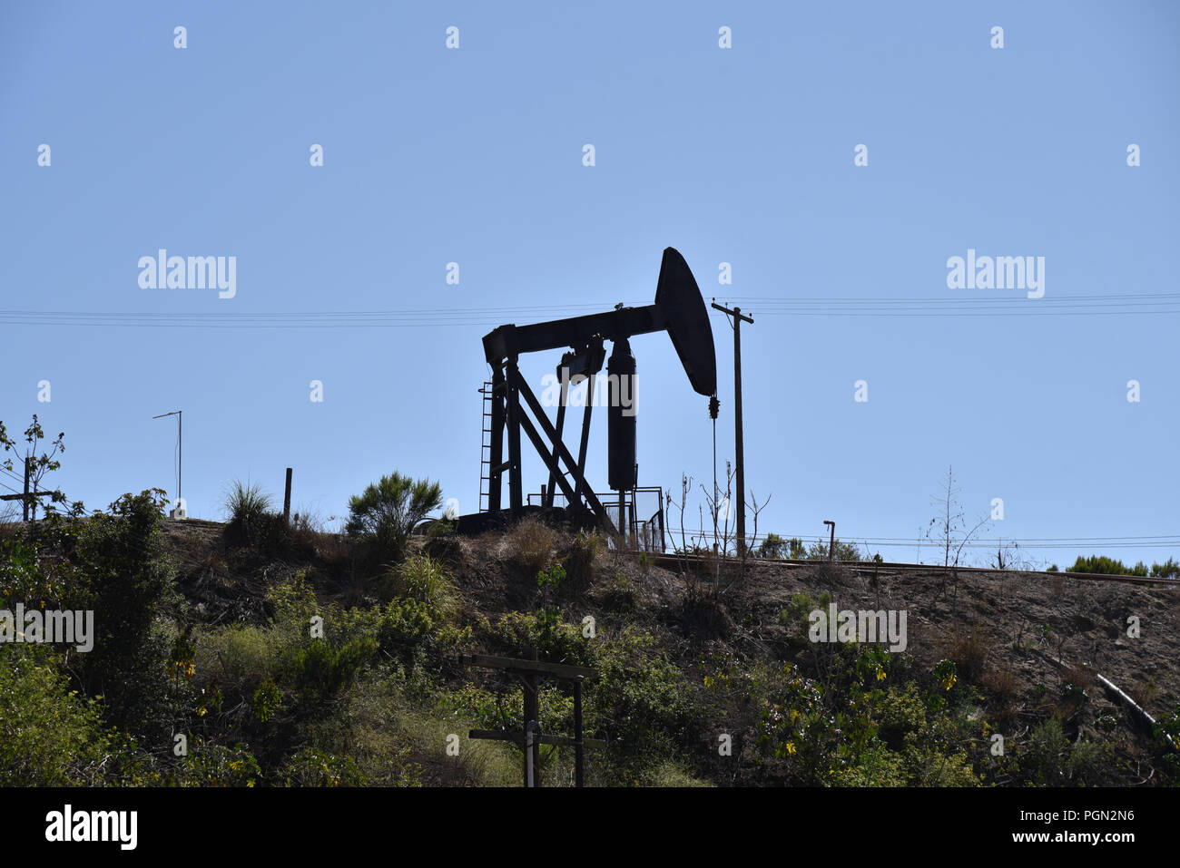 An oil pump jack within the city limits of Los Angeles Stock Photo Alamy
