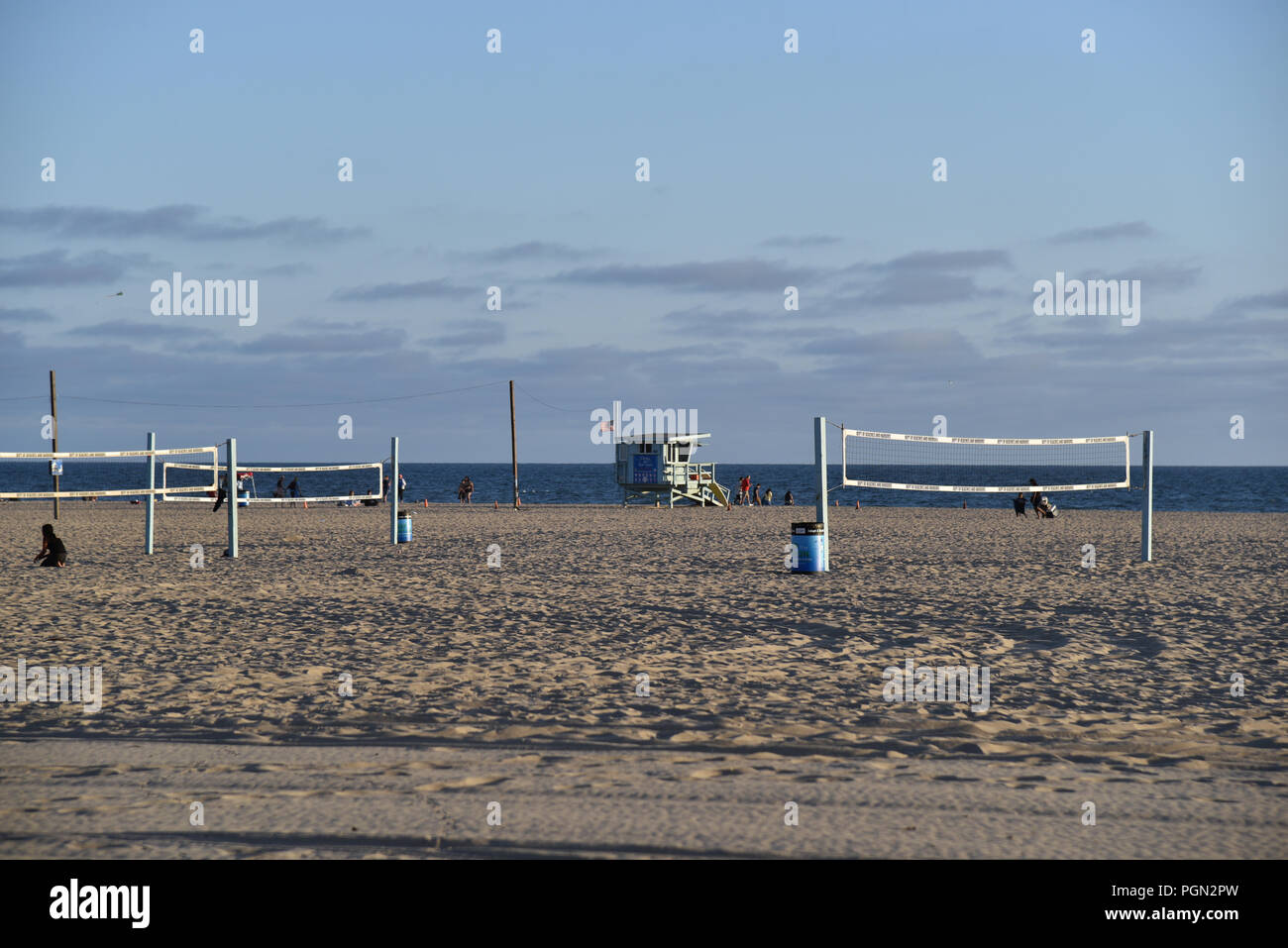 Volleyball nets on the beach near a lifeguard hut Stock Photo Alamy