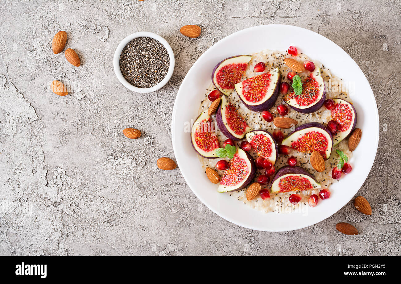 Delicious and healthy oatmeal with figs, almond and chia seeds. Healthy