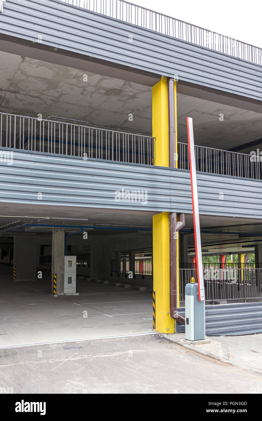 large empty multi-level parking garage with open driveway Stock Photo