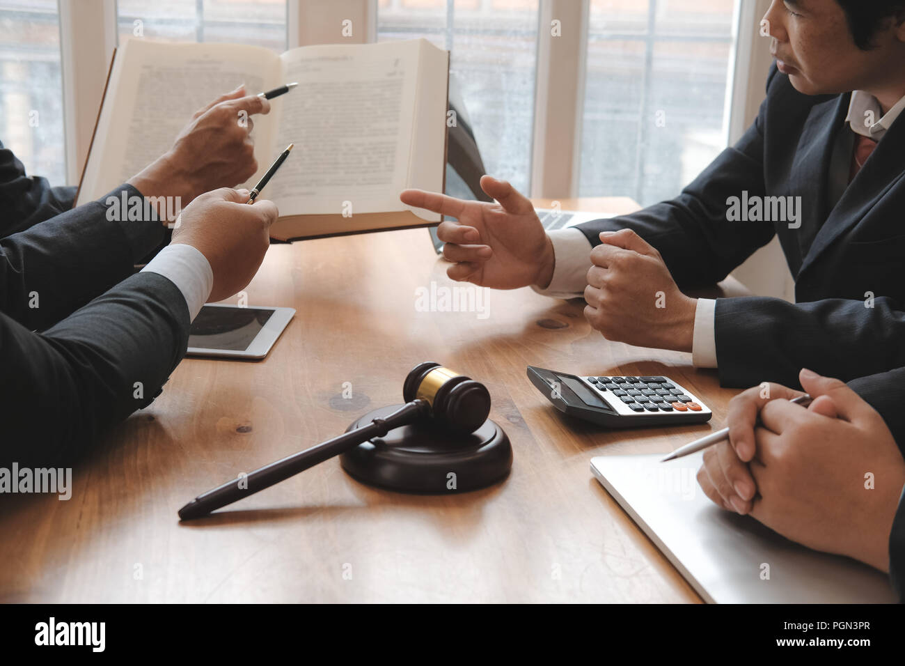 lawyer giving advice to business people. businessman discussing legal